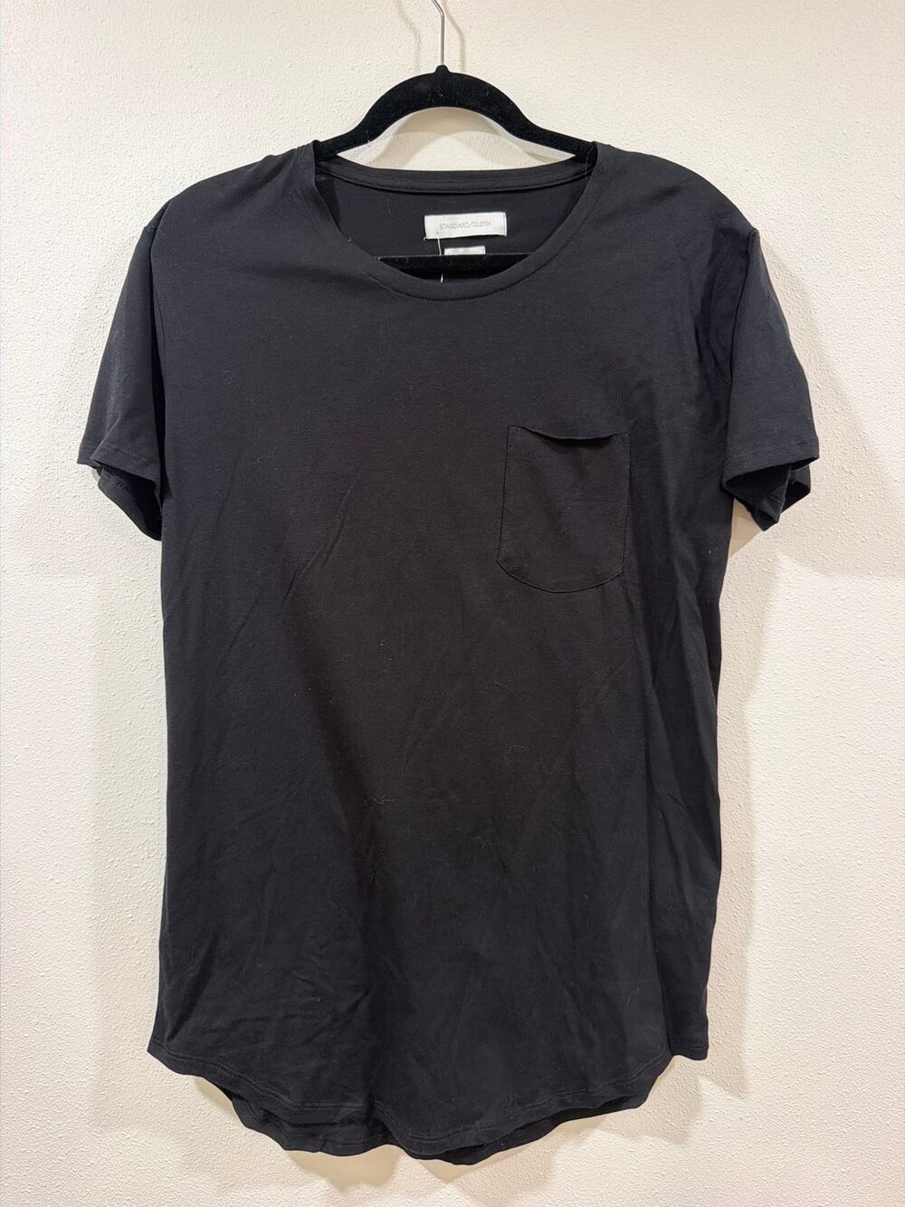 The item shown in the image is a Standard Cloth Scoop Neck Curved Hem Tee